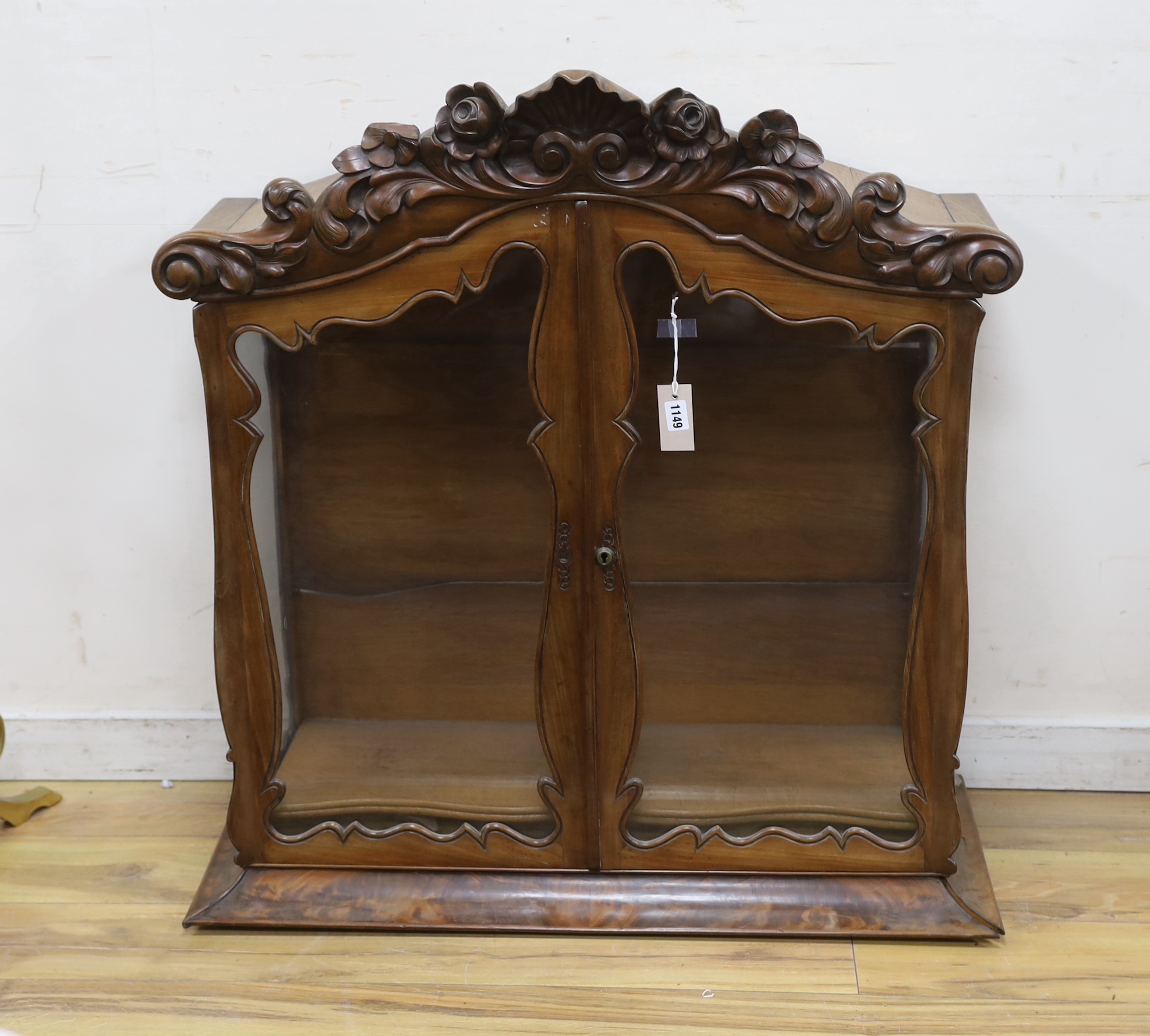 A Dutch style carved walnut cabinet top section, width 88cm, depth 37cm, height 95cm